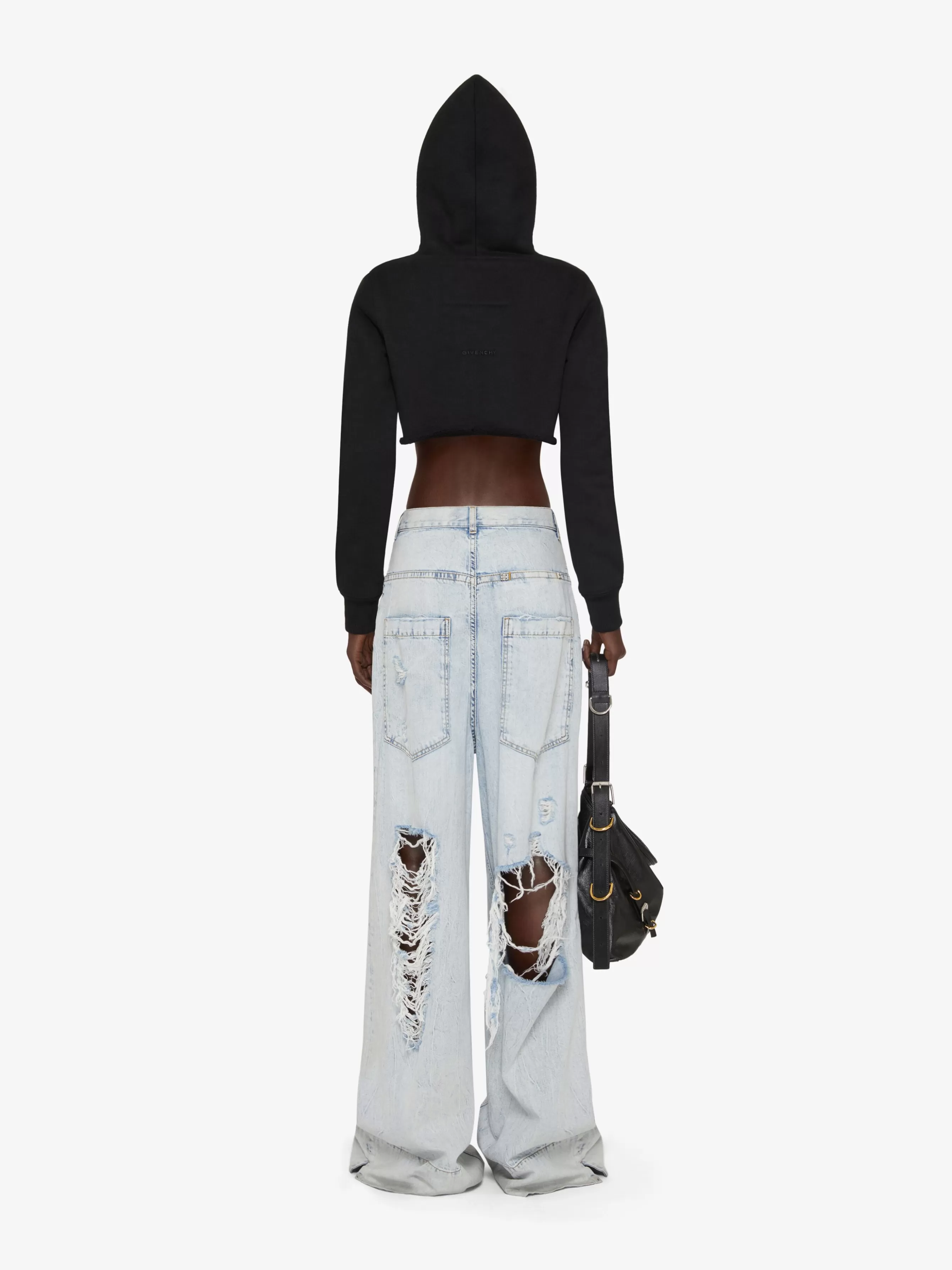 GIVENCHY Pants-Oversized jeans in destroyed denim